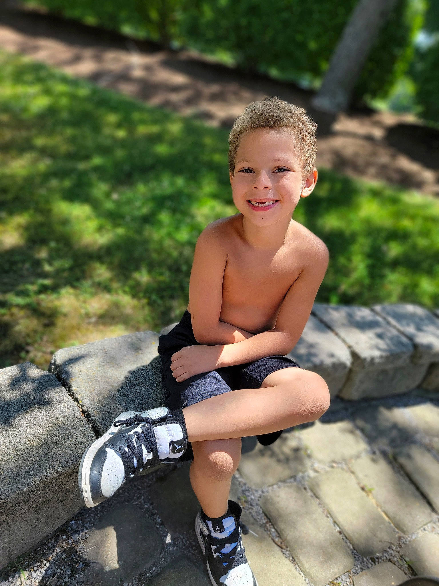 Camron is registered to the contest to win money with this photo: barechested, boot, child, electric_blue, flash_photography, fun, grass, happy, human_leg, joy, knee, leg, leisure, people_in_nature, person, recreation, shorts, smile, sock, thigh