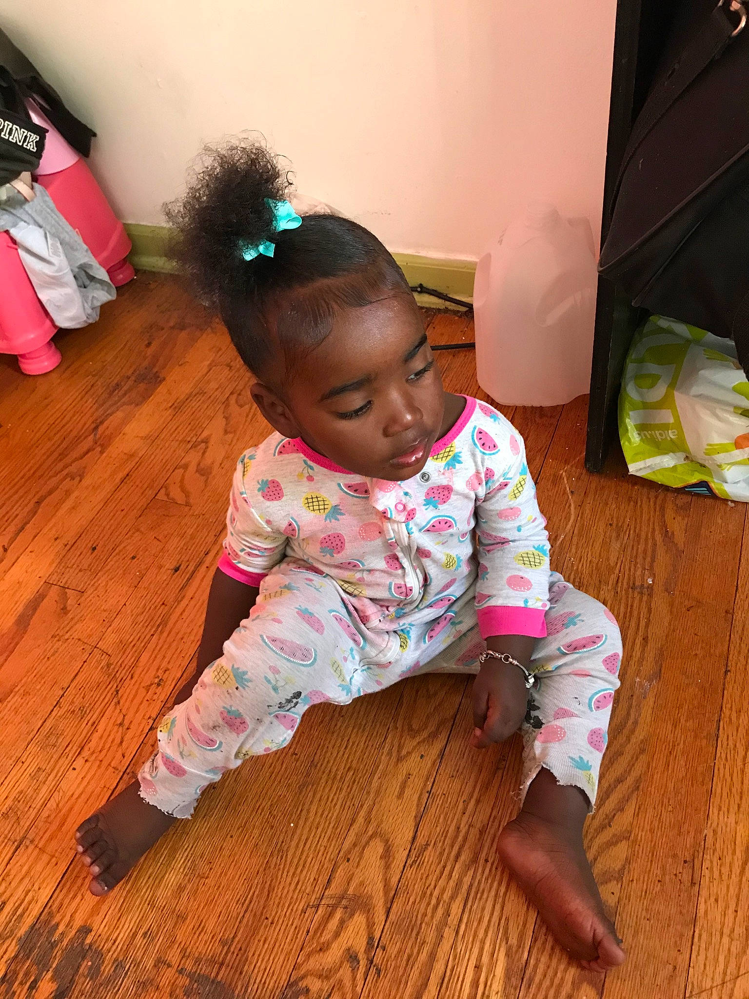 Alaia is registered to the contest to win money with this photo: baby, baby_toddler_clothing, cheek, child, floor, flooring, foot, happy, hardwood, laminate_flooring, magenta, person, pink, skin, sleeve, smile, toddler, varnish, wood, wood_flooring