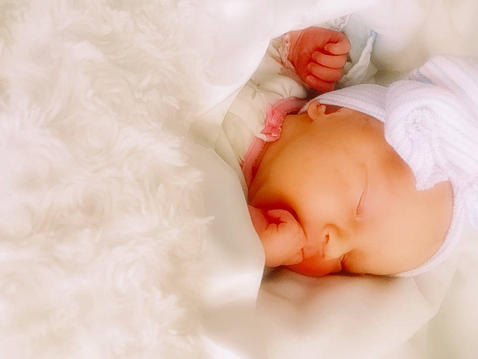 Persephone is registered to the contest to win money with this photo: baby, baby_sleeping, beauty, cheek, child, close_up, eye, face, hair_accessory, head, lip, mouth, nose, person, photograph, photography, pink, portrait_photography, skin, sleep