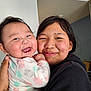 Kathleen Ann is registered to the contest to win money with this photo: affection, apparel, baby, casual_clothing, child, closeup, cute, face, family, happy, head, holding, hugging, indoor, long_hair, person, portrait, sibling, skin, smiling