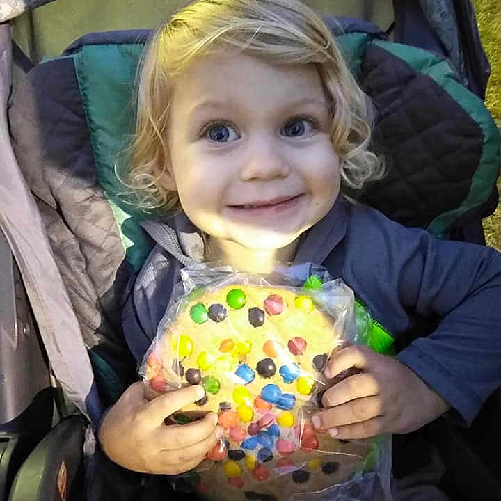 Bryce is registered to the contest to win money with this photo: child, day, eye, face, fun, girl, head, iris, joy, person, play, product, smile, toddler
