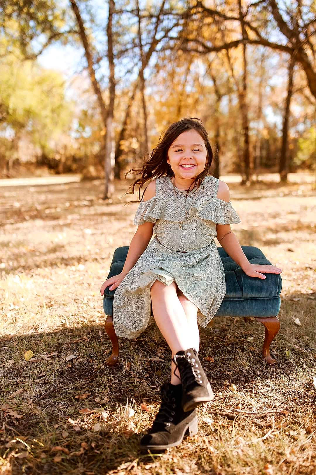 Kiyalyn is registered to the contest to win money with this photo: bag, beauty, boot, brown, clothing, denim, fashion, human_leg, joy, knee, leg, long_hair, outerwear, people_in_nature, person, shoe, sitting, street_fashion, sunlight, textile