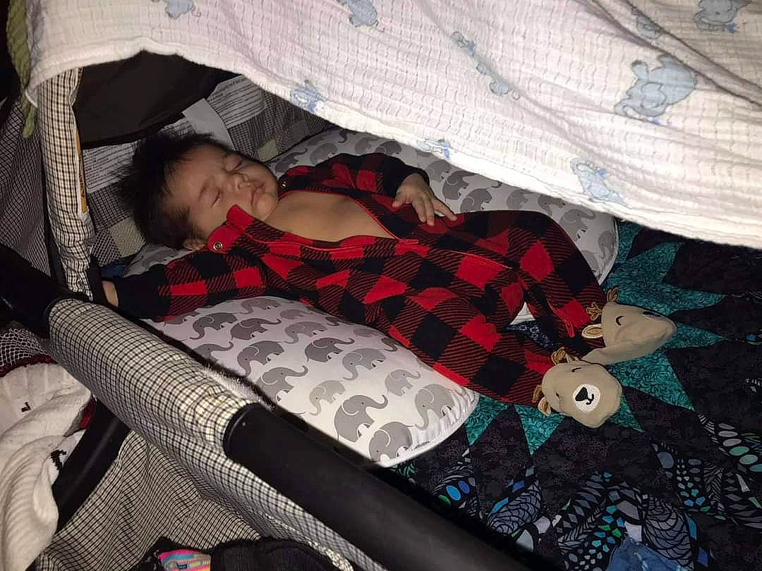 Bryxton joined the competition — help win amazing prizes! bed_sheet, bedding, blanket, carmine, comfort, design, linens, nap, pattern, person, plaid, polka_dot, sleep, sock, tartan, textile, tights