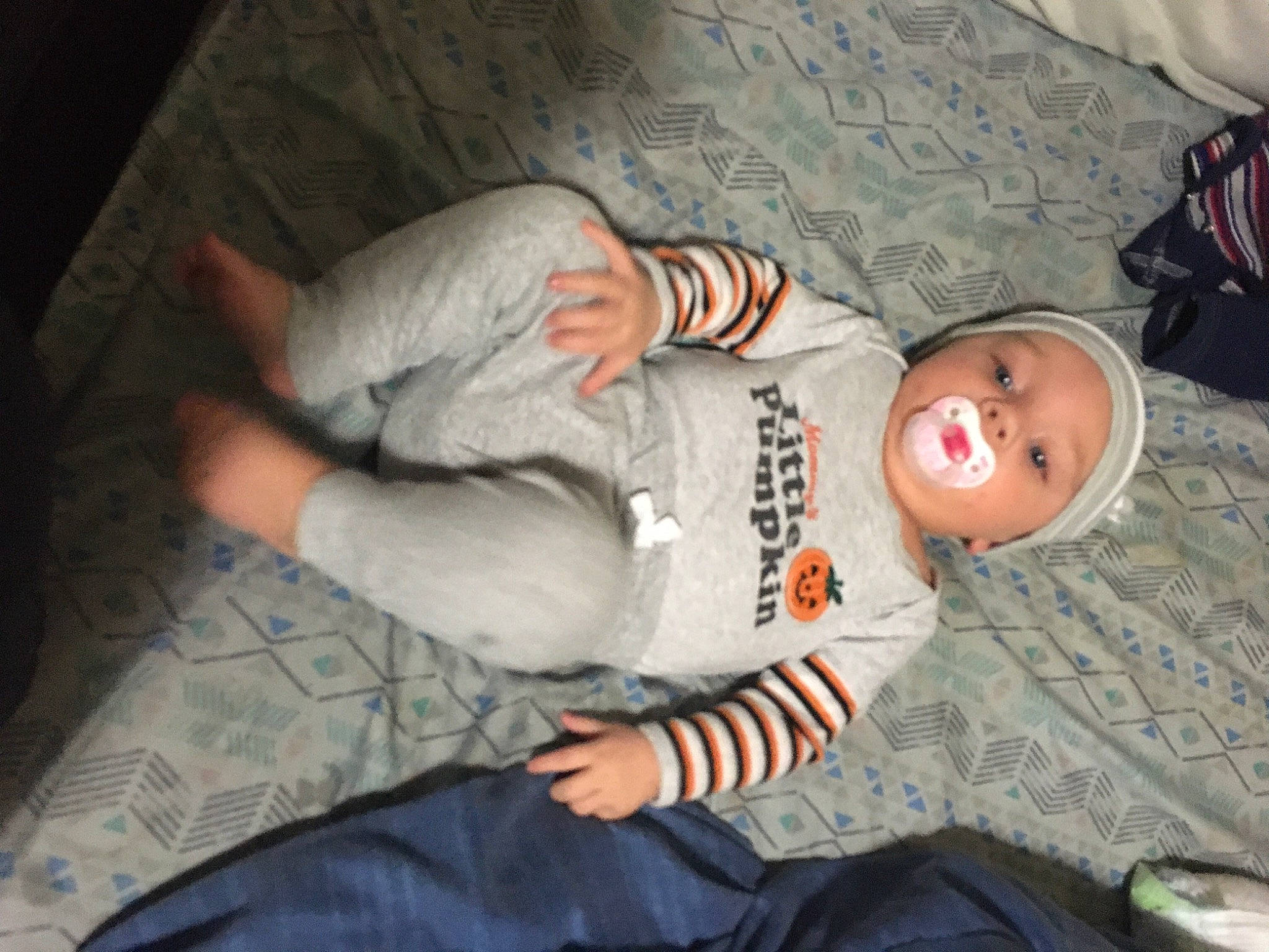 Kain is registered to the contest to win money with this photo: baby, baby_products, baby_toddler_clothing, bed, child, comfort, elbow, finger, flesh, fun, headwear, linens, mouth, nap, person, room, sitting, sleep, sleeve, t_shirt