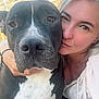 Pitte participe au concours pour gagner de l'argent avec cette photo : dog, woman, selfie, close_up, outdoor, pet, affection, black_and_white, fence, sky, casual_clothing, portrait, face, animal, companion, love, happy, friendship, candid, daylight