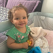 Emna participe au concours pour gagner de l'argent avec cette photo : baby, bed, blanket, bodypart, bread, couch, crib, cushion, face, finger, food, furniture, hand, head, homedecor, infantbed, linen, person, photography, portrait