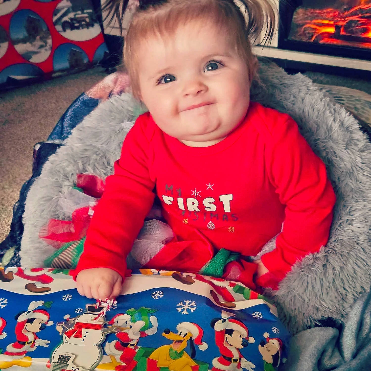 Astrid is registered to the contest to win money with this photo: baby, baby_toddler_clothing, beauty, carmine, cheek, child, happy, holiday, iris, joy, nose, pattern, person, red, sitting, skin, sleeve, smile, snapshot, t_shirt