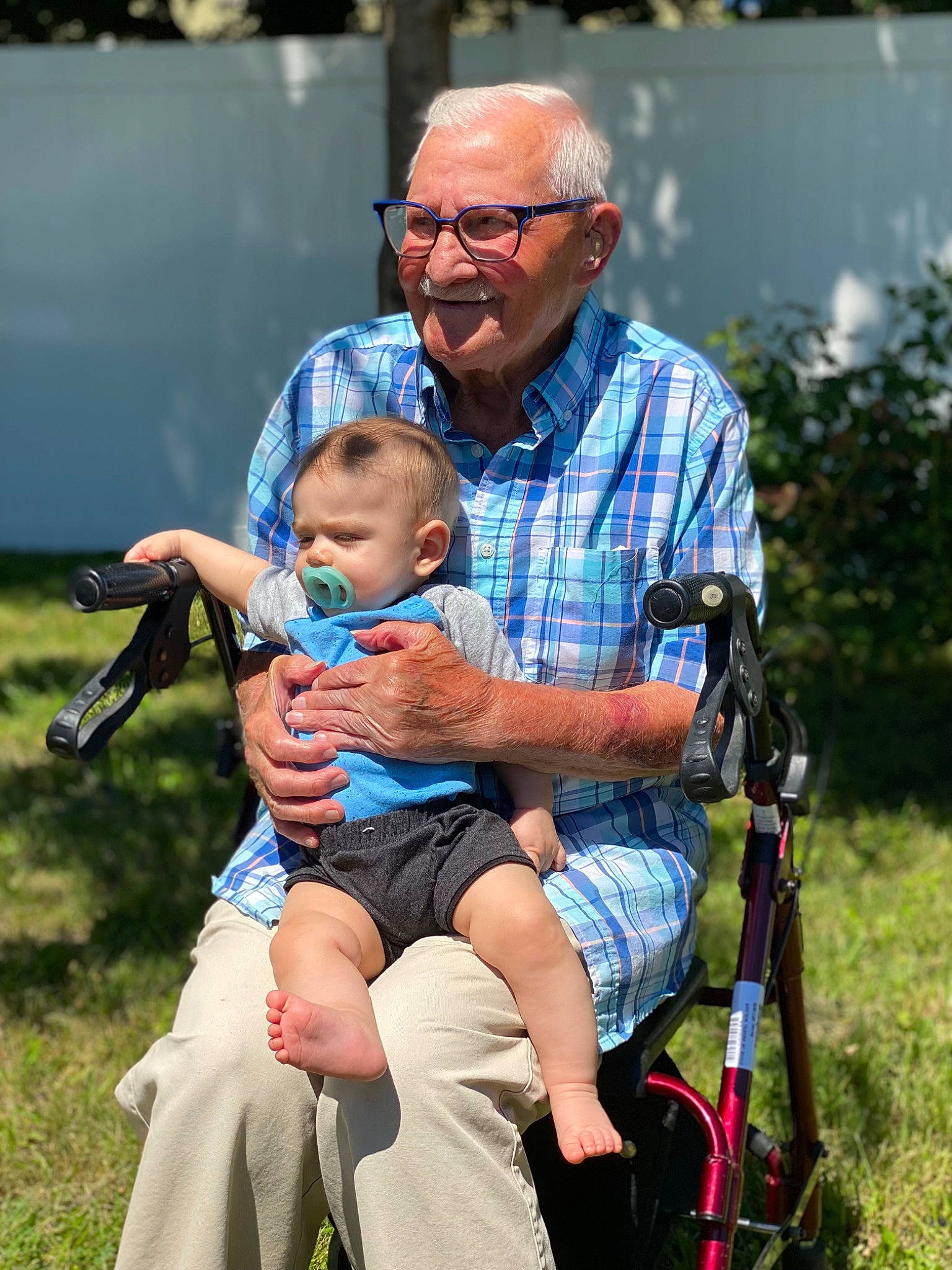 Kamdyn joined the competition — help win amazing prizes! baby, event, eyewear, face, fun, grass, happy, head, lap, lawn, leisure, people, people_in_nature, person, plant, recreation, shorts, smile, tire, toddler