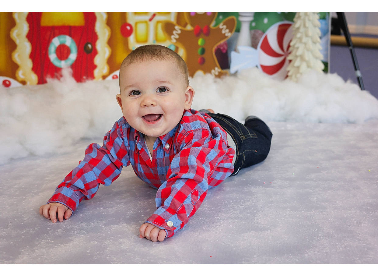 Leo is registered to the contest to win money with this photo: baby, baby_laughing, baby_toddler_clothing, carmine, child, comfort, event, flooring, font, fun, happy, joy, laugh, pattern, person, play, portrait_photography, sitting, sleeve, smile