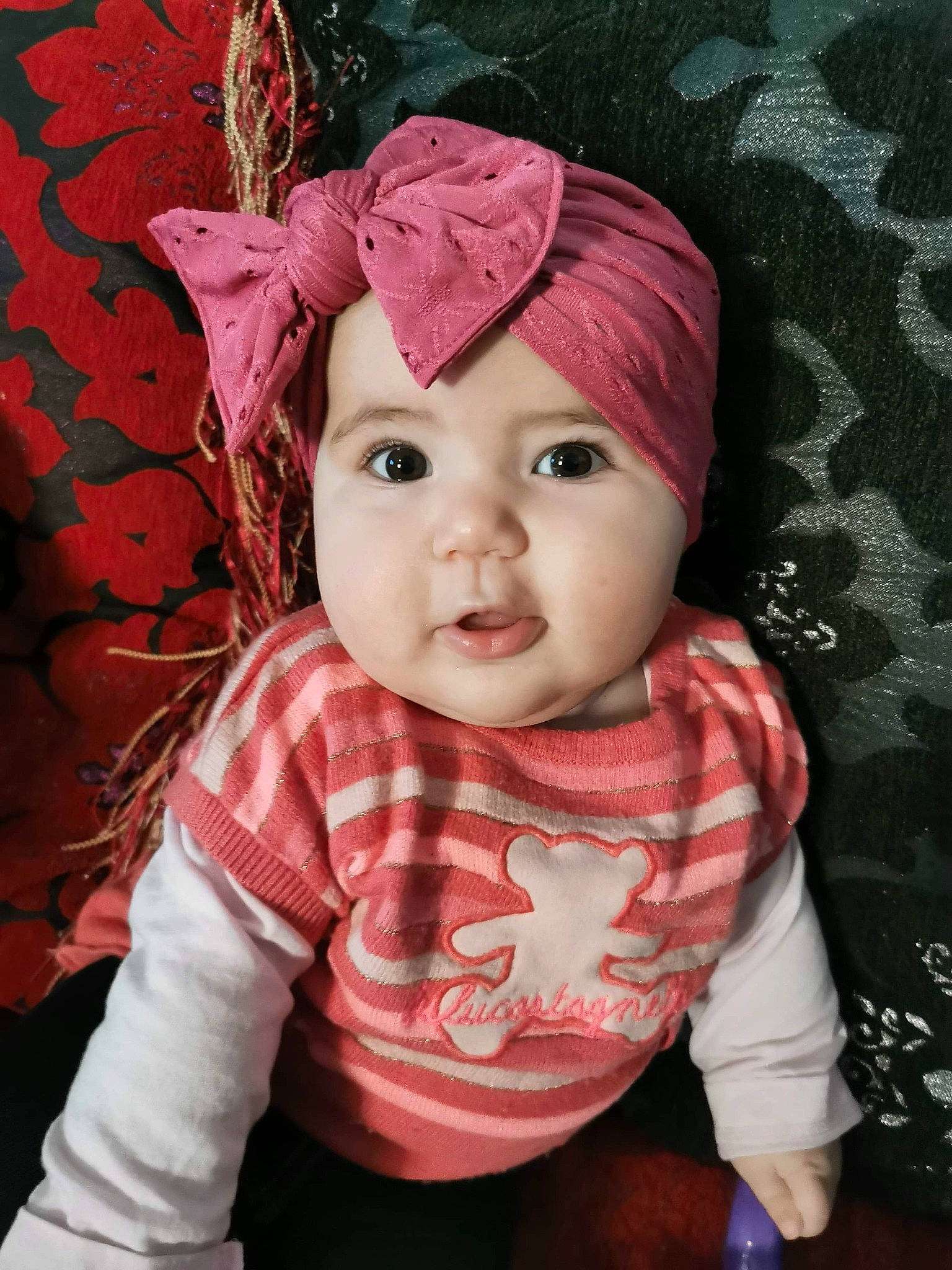 Kaïna participe au concours pour gagner de l'argent avec cette photo : baby, baby_toddler_clothing, beauty, cap, cheek, costume_hat, eye, eyelash, fashion_accessory, happy, headpiece, headwear, iris, knit_cap, lip, magenta, pattern, person, pink, sleeve