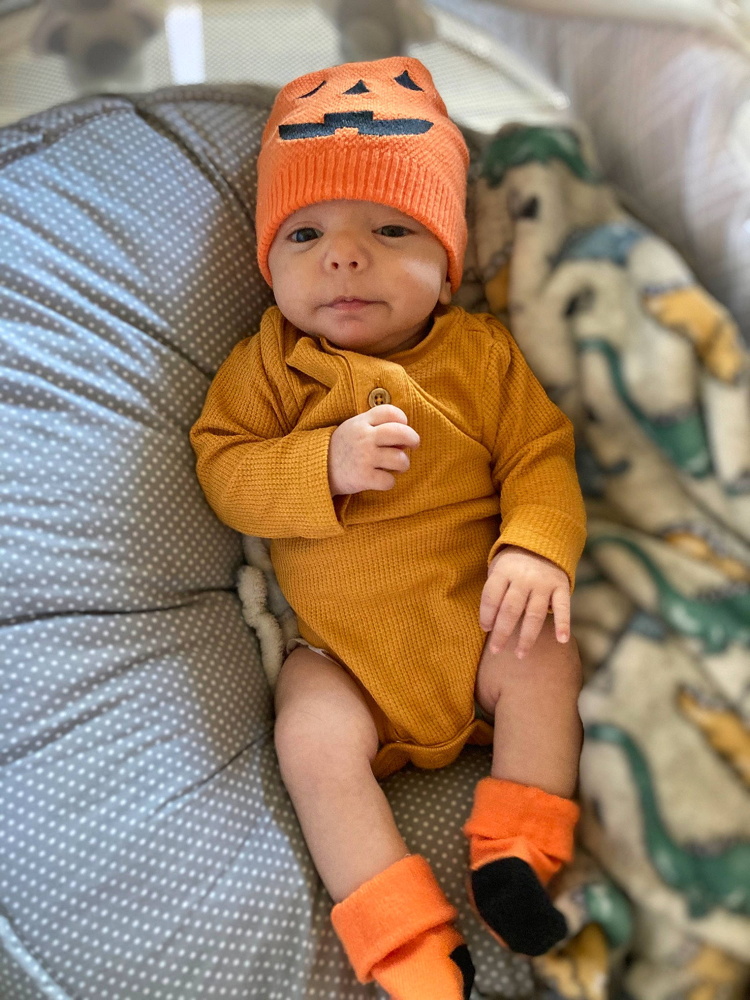 Jasiah joined the competition — help win amazing prizes! baby, baby_products, baby_sleeping, baby_toddler_clothing, cap, cheek, comfort, foot, head, headgear, headwear, human_leg, knee, knit_cap, linens, person, skin, sleeve, sock, thigh