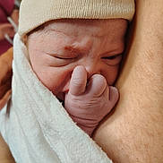 Star joined the competition — help win amazing prizes! newborn, baby, infant, wrapped, blanket, hat, hand, face, skin, closeup, person, human, cute, small, sleepy, expression, fingers, cozy, soft, newborn_baby