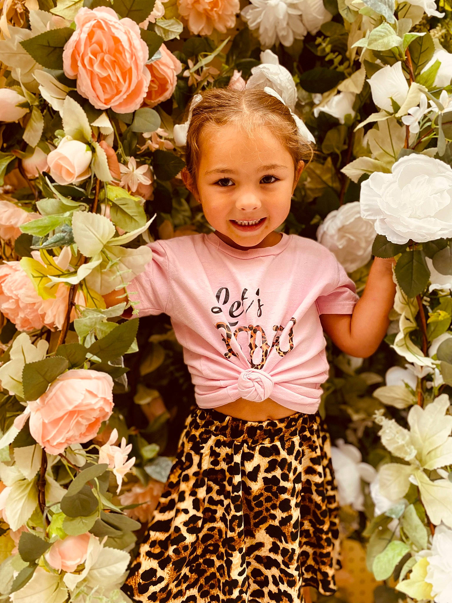Abbigail joined the competition — help win amazing prizes! baby_toddler_clothing, beauty, botany, child, face, flower, flower_arranging, happy, joy, leaf, people_in_nature, person, petal, photograph, pink, plant, rose, sleeve, smile, t_shirt