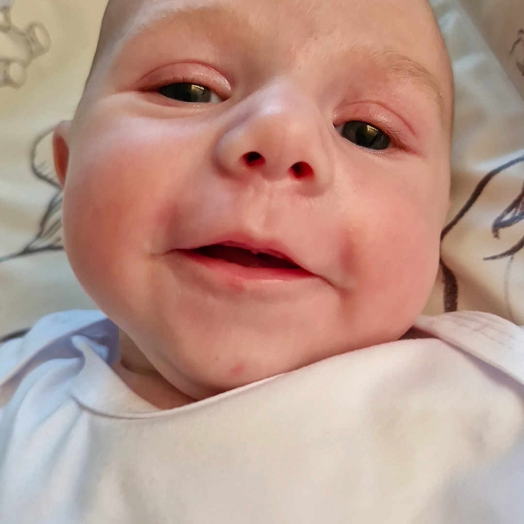 Theo joined the competition — help win amazing prizes! baby, bodypart, cutlery, face, finger, fork, hand, head, mouth, newborn, person, photography, portrait