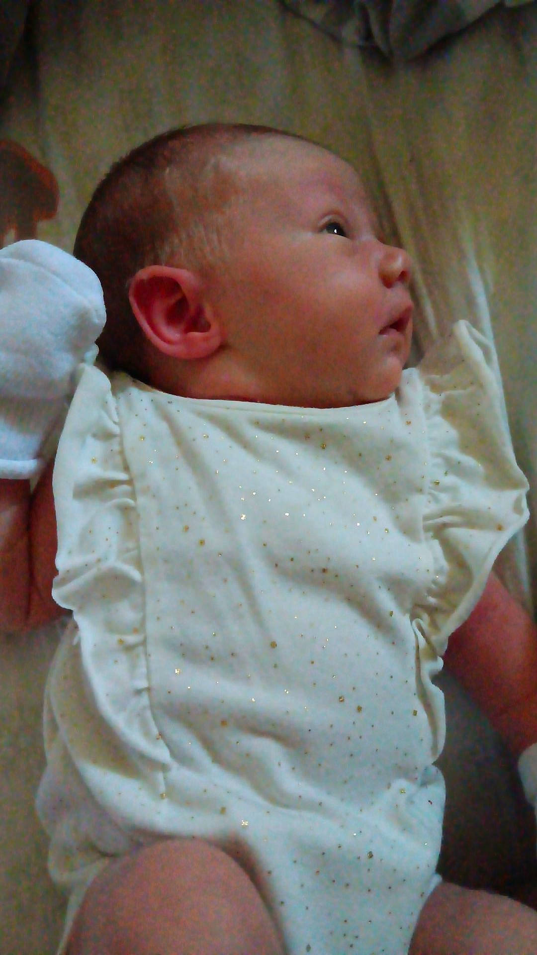 Jennifer joined the competition — help win amazing prizes! baby, baby_products, baby_safety, baby_toddler_clothing, cheek, child, chin, comfort, linens, pattern, person, sitting, skin, sleeve, toddler, wood