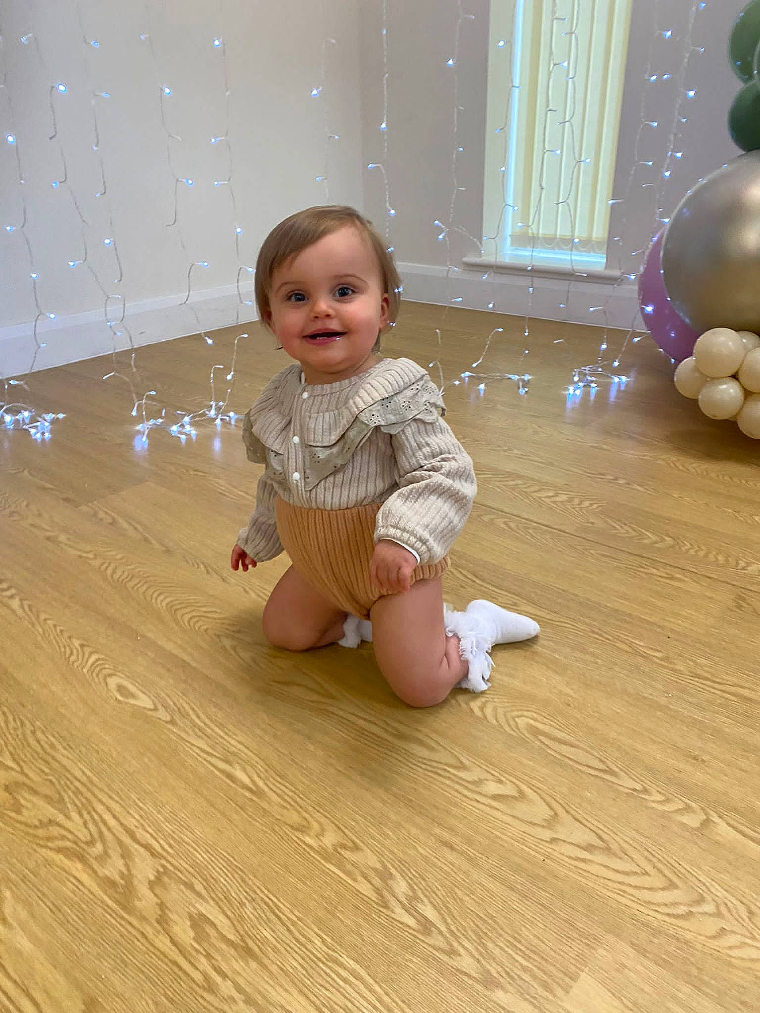 Willow joined the competition — help win amazing prizes! baby_toddler_clothing, cheek, child, floor, flooring, foot, fun, happy, hardwood, human_leg, joint, joy, laminate_flooring, pattern, person, skin, smile, standing, toddler, varnish