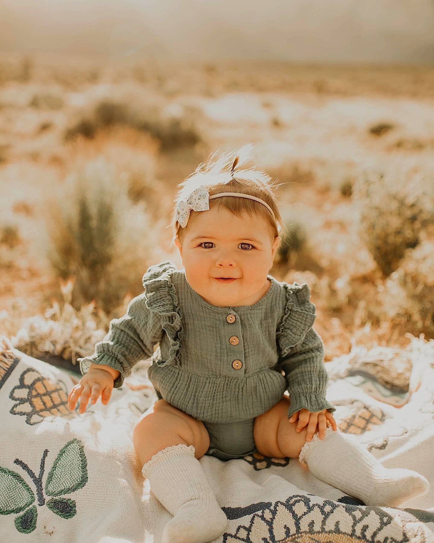 Blayke is registered to the contest to win money with this photo: baby, child, child_model, fawn, happy, headwear, joy, people, people_in_nature, person, photo_shoot, photograph, photography, portrait, portrait_photography, sitting, skin, smile, toddler, yellow