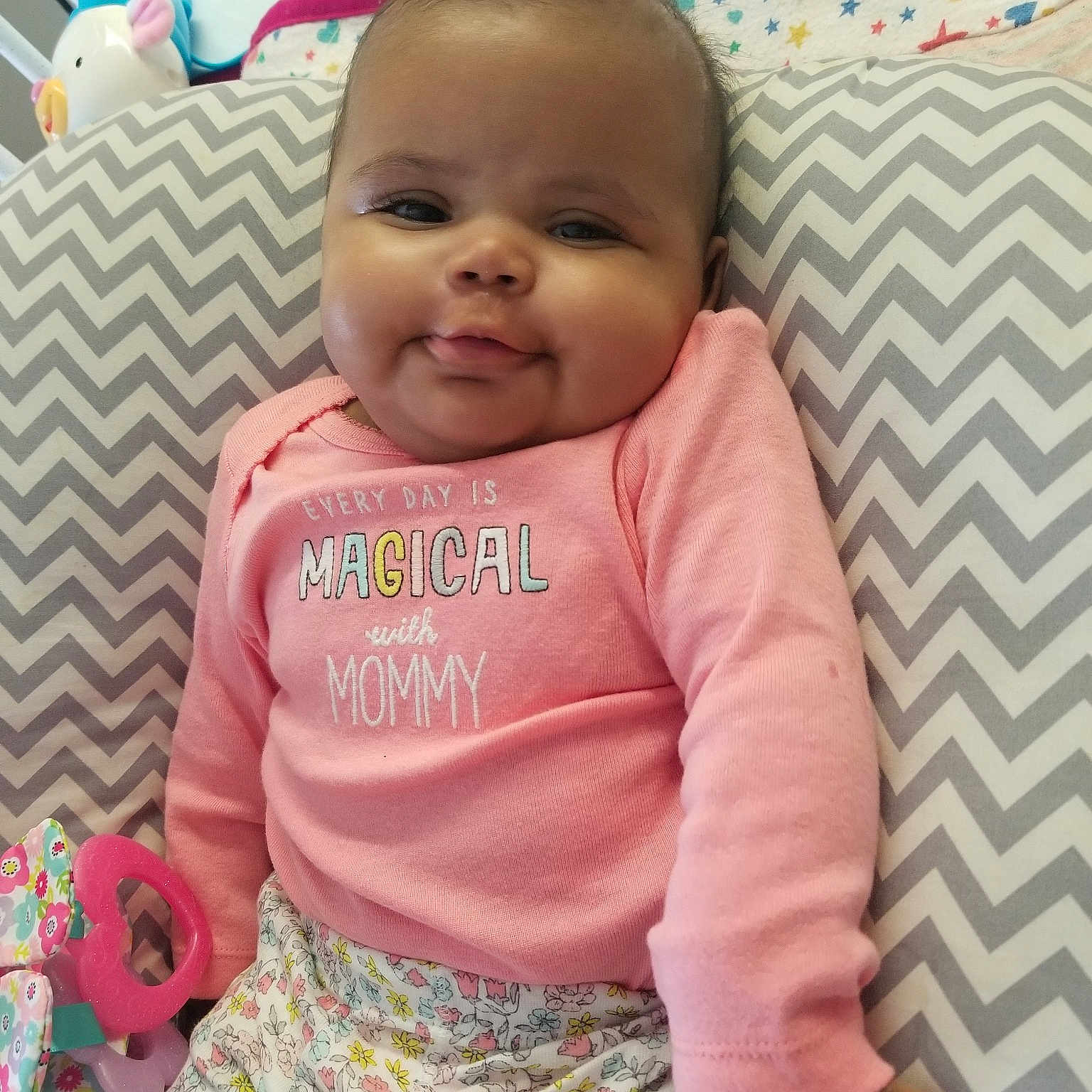 Jream is registered to the contest to win money with this photo: baby_products, cheek, child, day, eye, facial_expression, girl, infant, iris, pattern, person, pink, play, product, skin, smile, textile, toddler