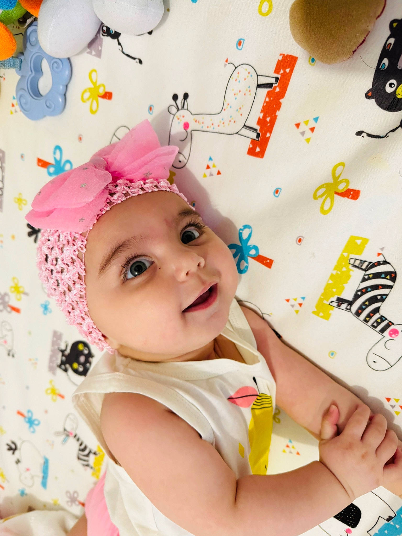 Elina participe au concours pour gagner de l'argent avec cette photo : baby, baby_playing_with_toys, baby_products, baby_toddler_clothing, child, event, fashion_accessory, fun, happy, headgear, headwear, magenta, party_supply, people, person, photograph, pink, play, room, smile