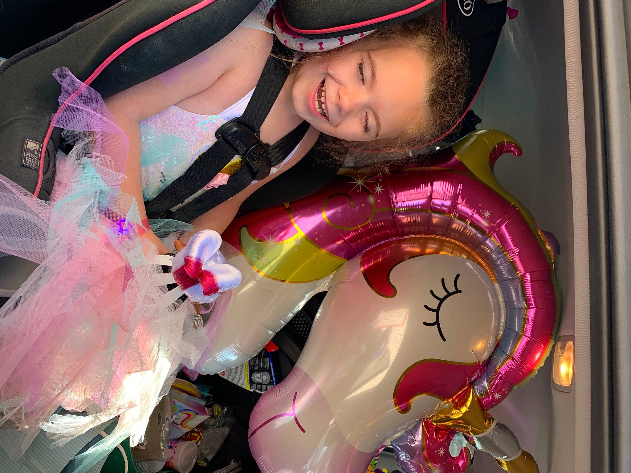 Aubreigh joined the competition — help win amazing prizes! baseball_cap, cap, costume, entertainment, event, eyewear, fashion, fashion_accessory, fictional_character, fun, joy, light, magenta, person, personal_protective_equipment, pink, recreation, smile, space, tradition