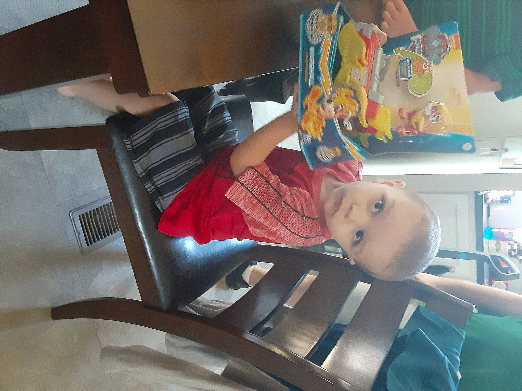 Eddie is registered to the contest to win money with this photo: art, furniture, person