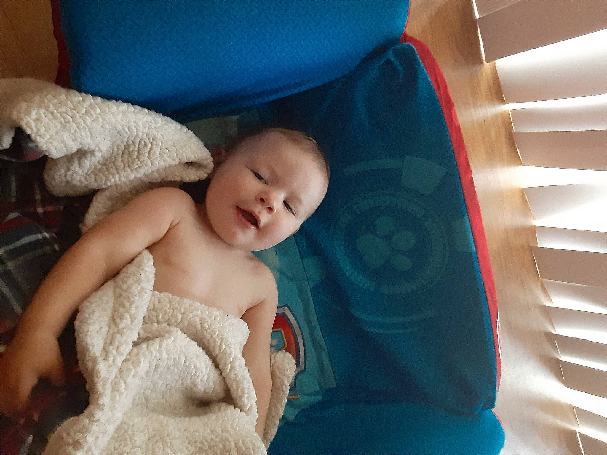 Bentley is registered to the contest to win money with this photo: abdomen, baby, baby_products, baby_sleeping, birth, child, comfort, eye, linens, person, product, skin, textile, toddler, vacation
