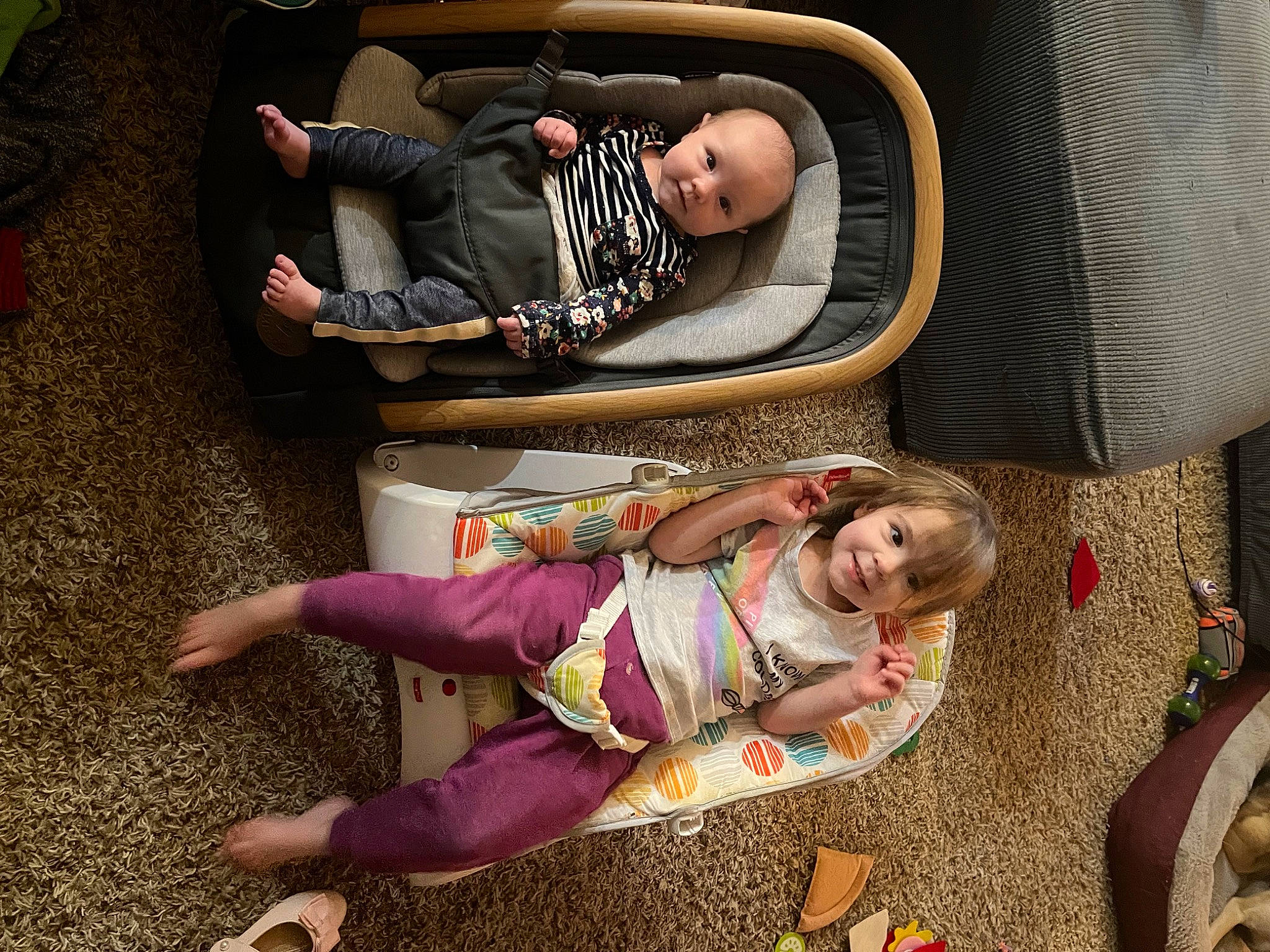 Alaina is registered to the contest to win money with this photo: baby, baby_products, baby_toddler_clothing, bag, boot, child, comfort, fun, grass, human_leg, joy, knee, lap, leg, leisure, luggage_and_bags, person, shoe, sitting, sneakers