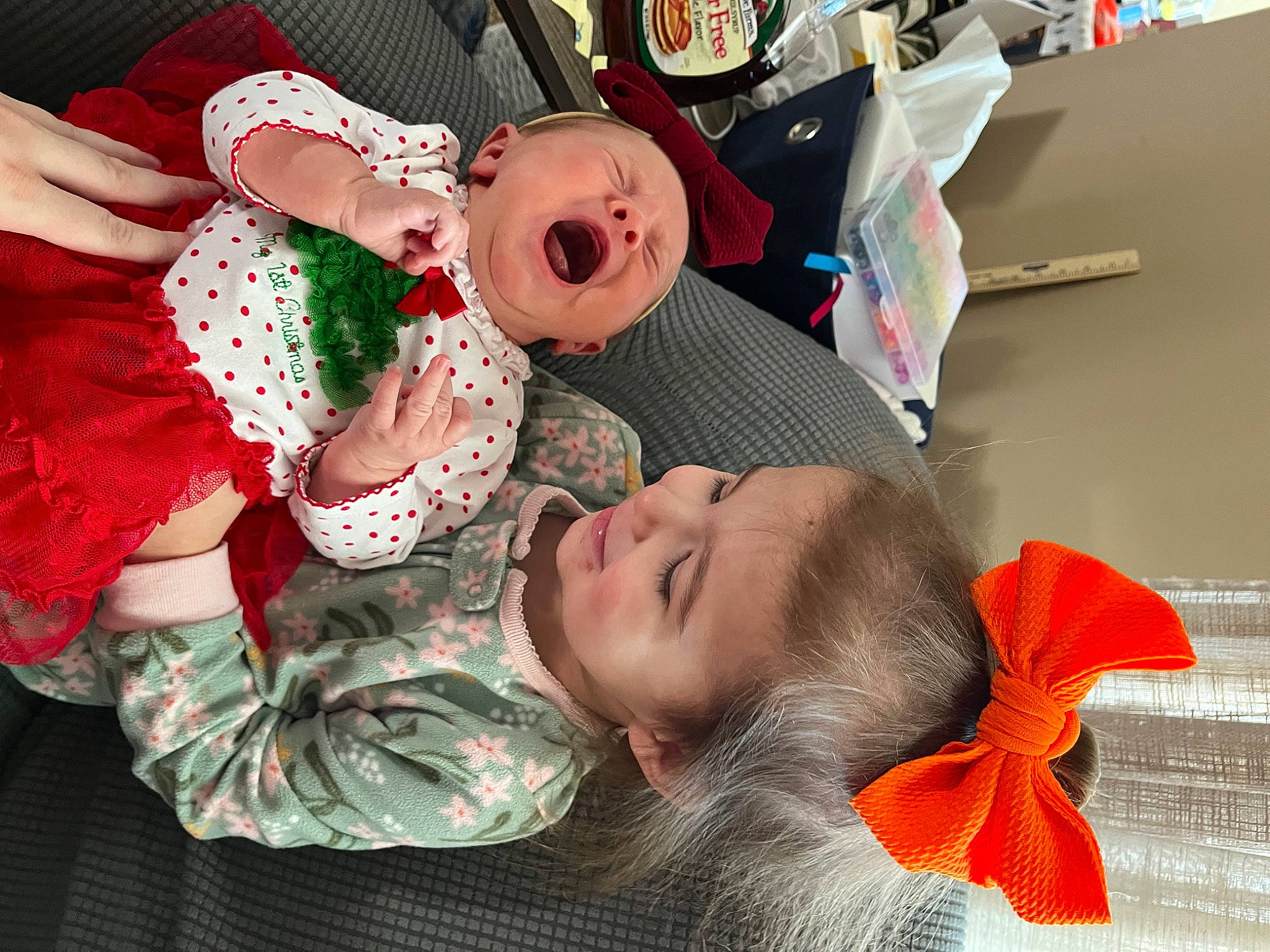 Alaina is registered to the contest to win money with this photo: baby, baby_products, baby_toddler_clothing, child, comfort, event, fashion_accessory, fun, happy, headwear, mouth, pattern, person, room, toddler