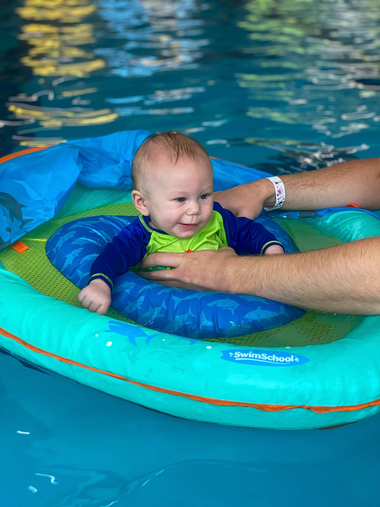Kaysen is registered to the contest to win money with this photo: aqua, azure, baby, baby_float, baby_products, baby_toddler_clothing, blue, child, fun, games, happy, inflatable, leisure, outdoor_recreation, person, personal_protective_equipment, play, recreation, swimming_pool, toddler