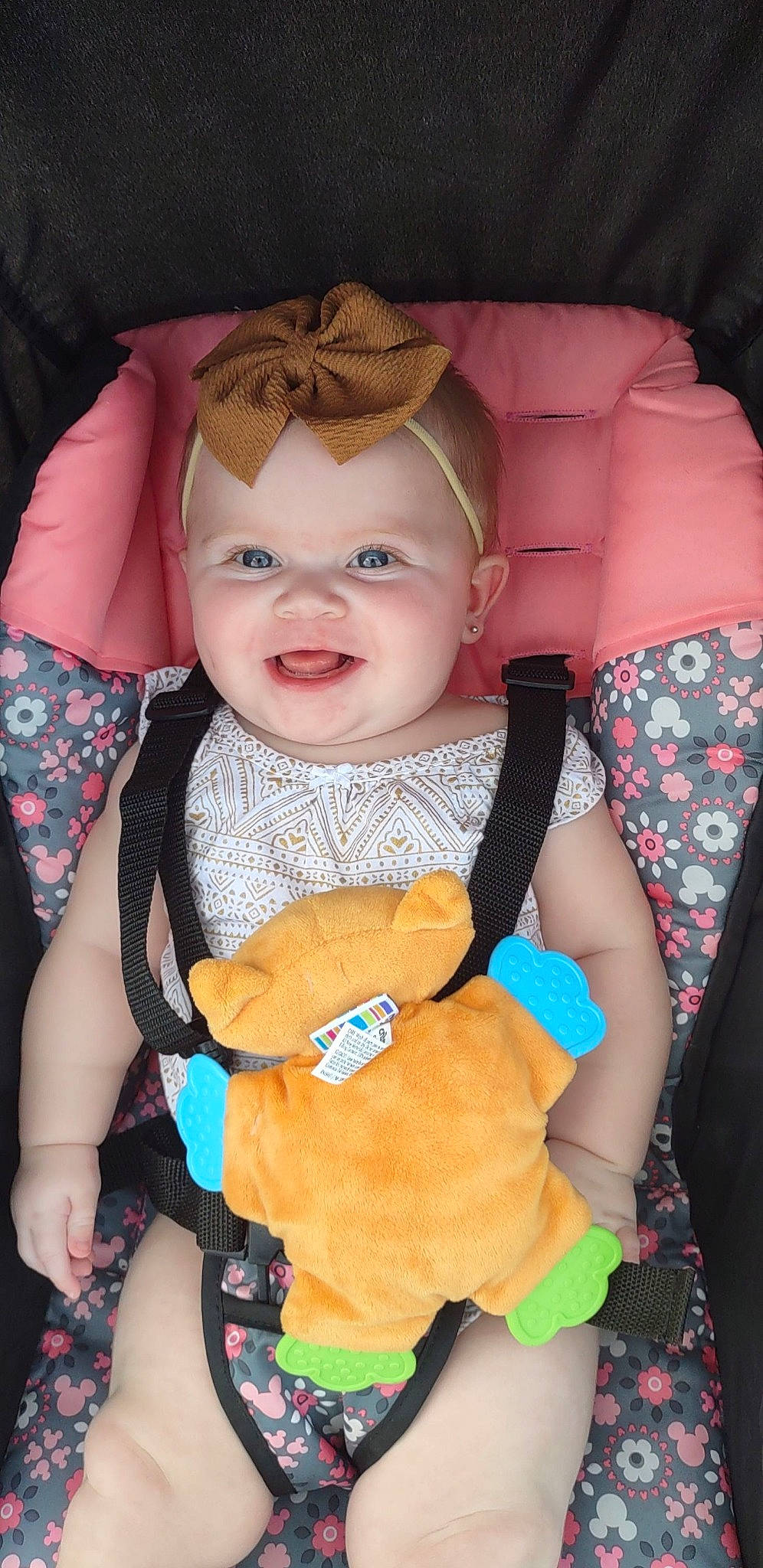 Alyvia is registered to the contest to win money with this photo: baby, baby_carriage, baby_products, baby_toddler_clothing, cheek, child, comfort, eye, finger, fun, happy, head, human_body, joy, lap, person, pink, product, skin, smile