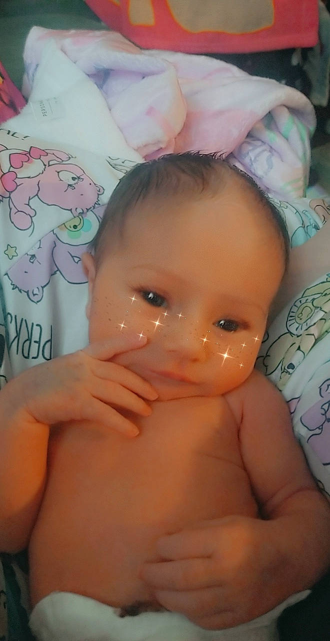 Estella is registered to the contest to win money with this photo: arm, cheek, chin, eye, eyebrow, eyelash, face, facial_expression, forehead, hair, hairstyle, hand, head, joint, lip, mouth, muscle, nose, person, skin