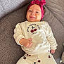 Bonnie participe au concours pour gagner de l'argent avec cette photo : baby, infant, smile, headband, cherry, outfit, couch, fabric, clothing, child, person, cute, happy, indoor, portrait, sitting, hand, face, head, texture