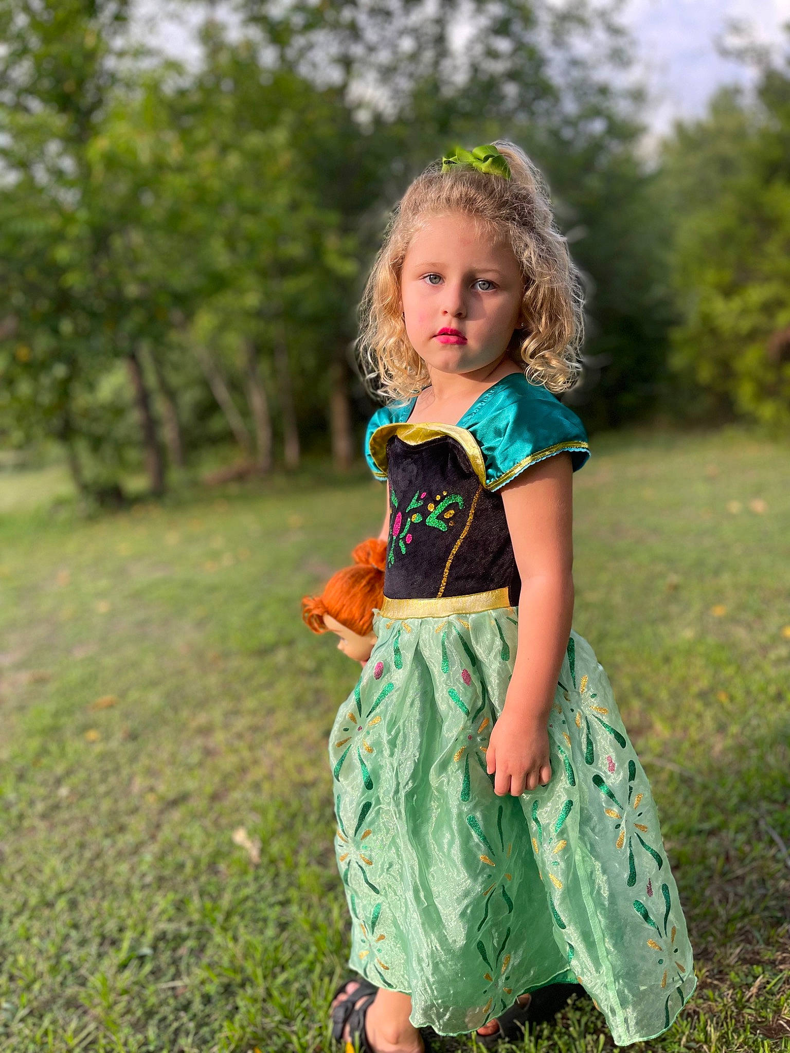 Kimber joined the competition — help win amazing prizes! baby_toddler_clothing, blond, day_dress, denim, dress, electric_blue, field, grass, grassland, happy, human_leg, leisure, meadow, people_in_nature, person, plant, prairie, toddler, tree, trunk