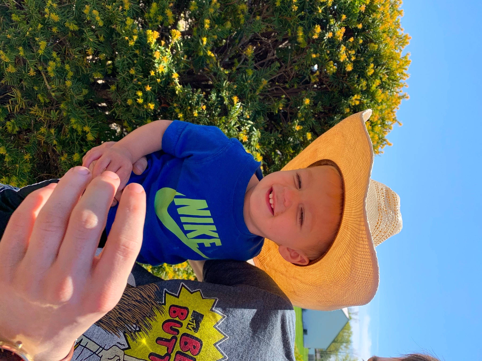 Aidan joined the competition — help win amazing prizes! baseball_cap, blurred, cap, daytime, finger, gesture, grass, hand, happy, hat, headgear, headwear, leaf, leisure, people_in_nature, person, photograph, plant, sky, smile