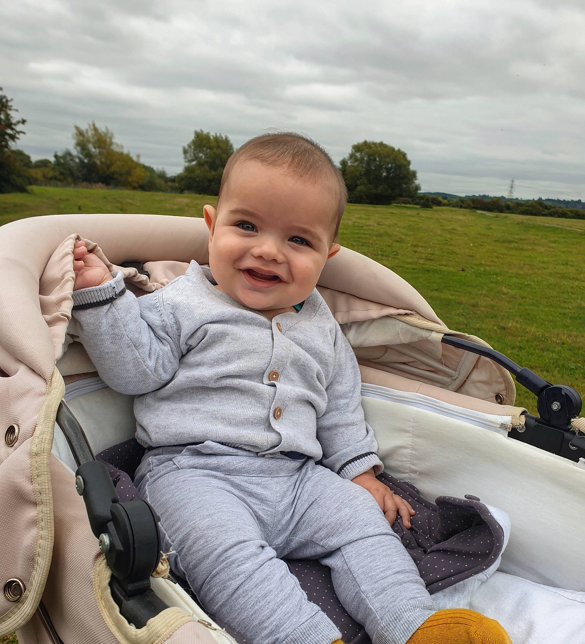 Matei joined the competition — help win amazing prizes! automotive_exterior, baby_toddler_clothing, calabaza, child, cloud, comfort, fun, grass, happy, joy, lap, leisure, motor_vehicle, person, plant, recreation, skin, sky, smile, toddler
