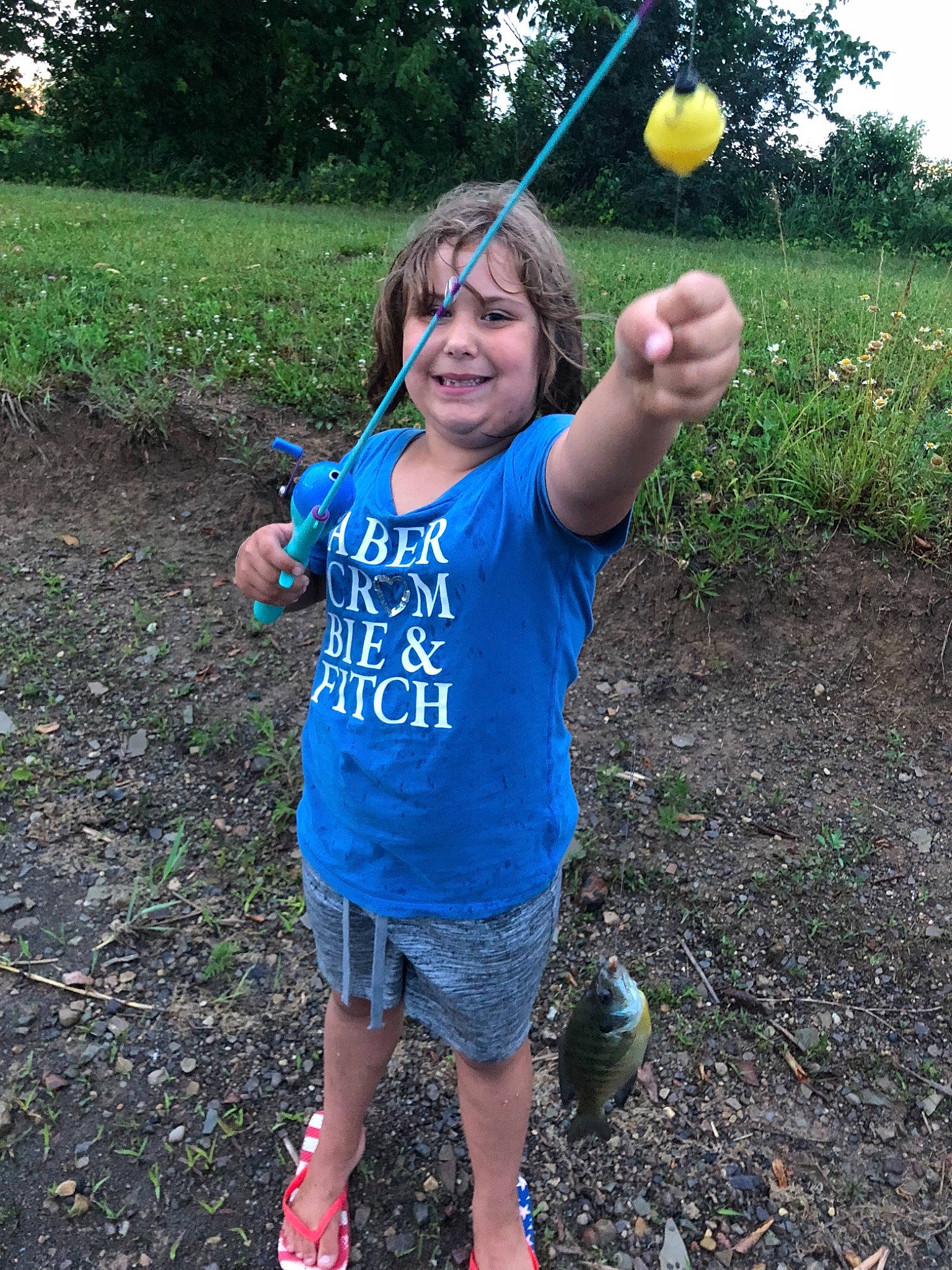 Brookelynn joined the competition — help win amazing prizes! blue, child, clothing, day, emotion, facial_expression, fun, garden, girl, grass, joy, nature, person, plant, play, smile, summer, tree, vacation, vertebrate