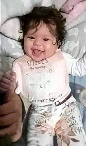 Dameri is registered to the contest to win money with this photo: baby, baby_toddler_clothing, cheek, eyebrow, facial_expression, finger, gesture, hair, hand, happy, head, iris, mouth, neck, nose, person, skin, sleeve, smile, t_shirt