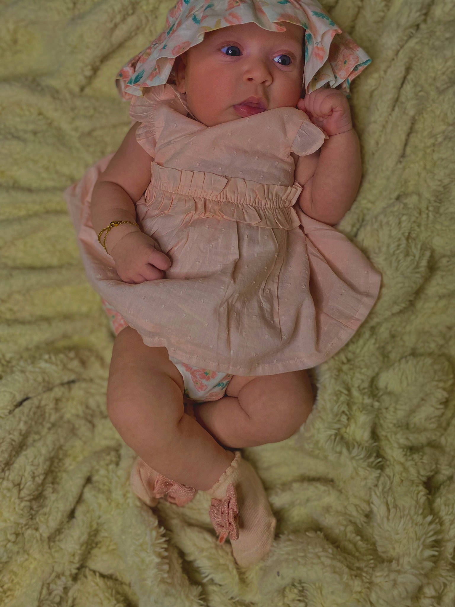 Elayani is registered to the contest to win money with this photo: baby, baby_toddler_clothing, cheek, day_dress, dress, embellishment, eye, face, head, headgear, headwear, human_body, iris, leg, pattern, person, pink, skin, sleeve, thigh