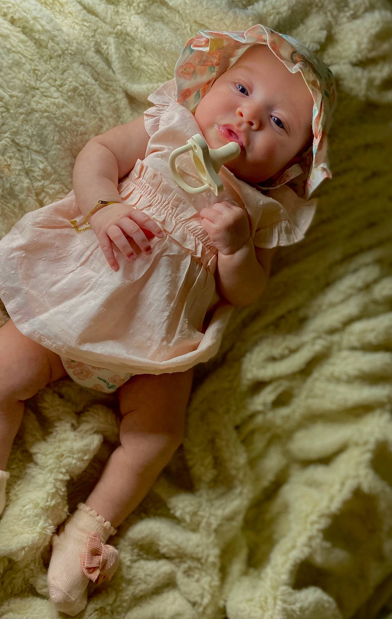 Elayani joined the competition — help win amazing prizes! baby, baby_toddler_clothing, blond, child, comfort, dress, embellishment, fashion_accessory, fawn, fur, headwear, human_leg, linens, pattern, peach, person, pink, sitting, skin, sleeve