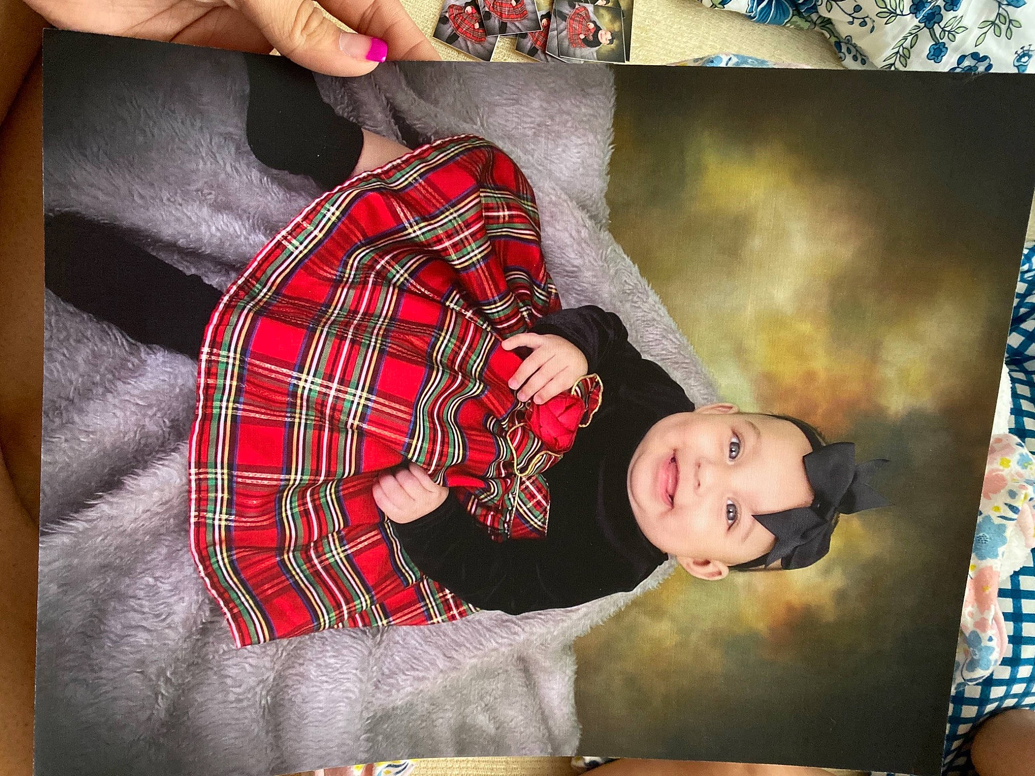 Emma Lynn is registered to the contest to win money with this photo: art, baby, bedding, bedtime, carmine, child, comfort, design, joy, linens, magenta, pattern, person, plaid, rectangle, room, sleeve, tartan, textile, toddler