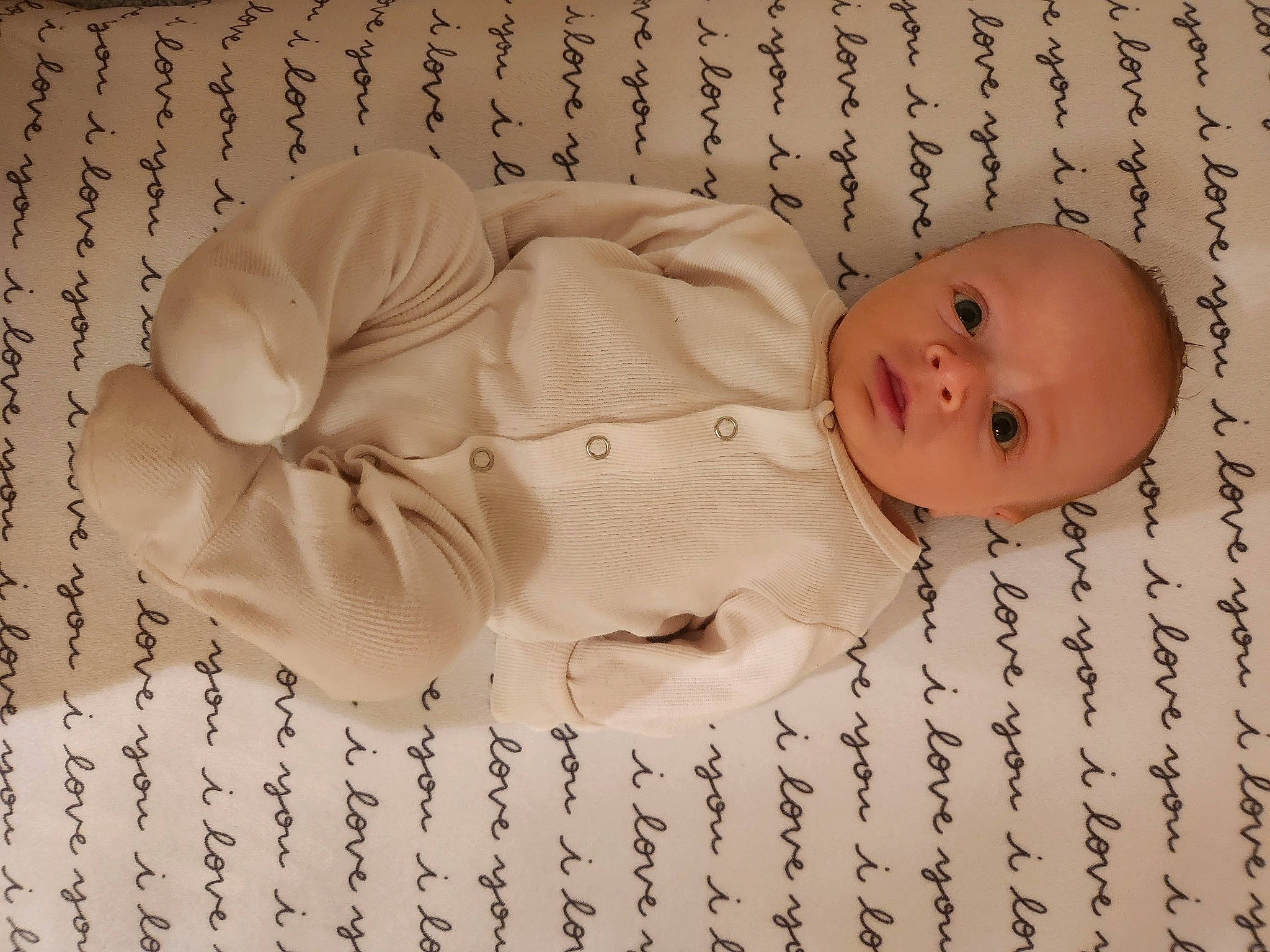 Mika is registered to the contest to win money with this photo: baby, baby_products, baby_safety, baby_sleeping, baby_toddler_clothing, bedtime, child, comfort, face, font, head, headgear, illustration, infant_bed, linens, pattern, person, sleep, textile, toddler