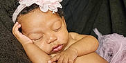 Azari is registered to the contest to win money with this photo: baby, sleeping, flower_headband, pink_tutu, infant, cute, peaceful, resting, child, portrait, soft, newborn, adorable, hand, face, skin, closed_eyes, cozy, blanket, tulle