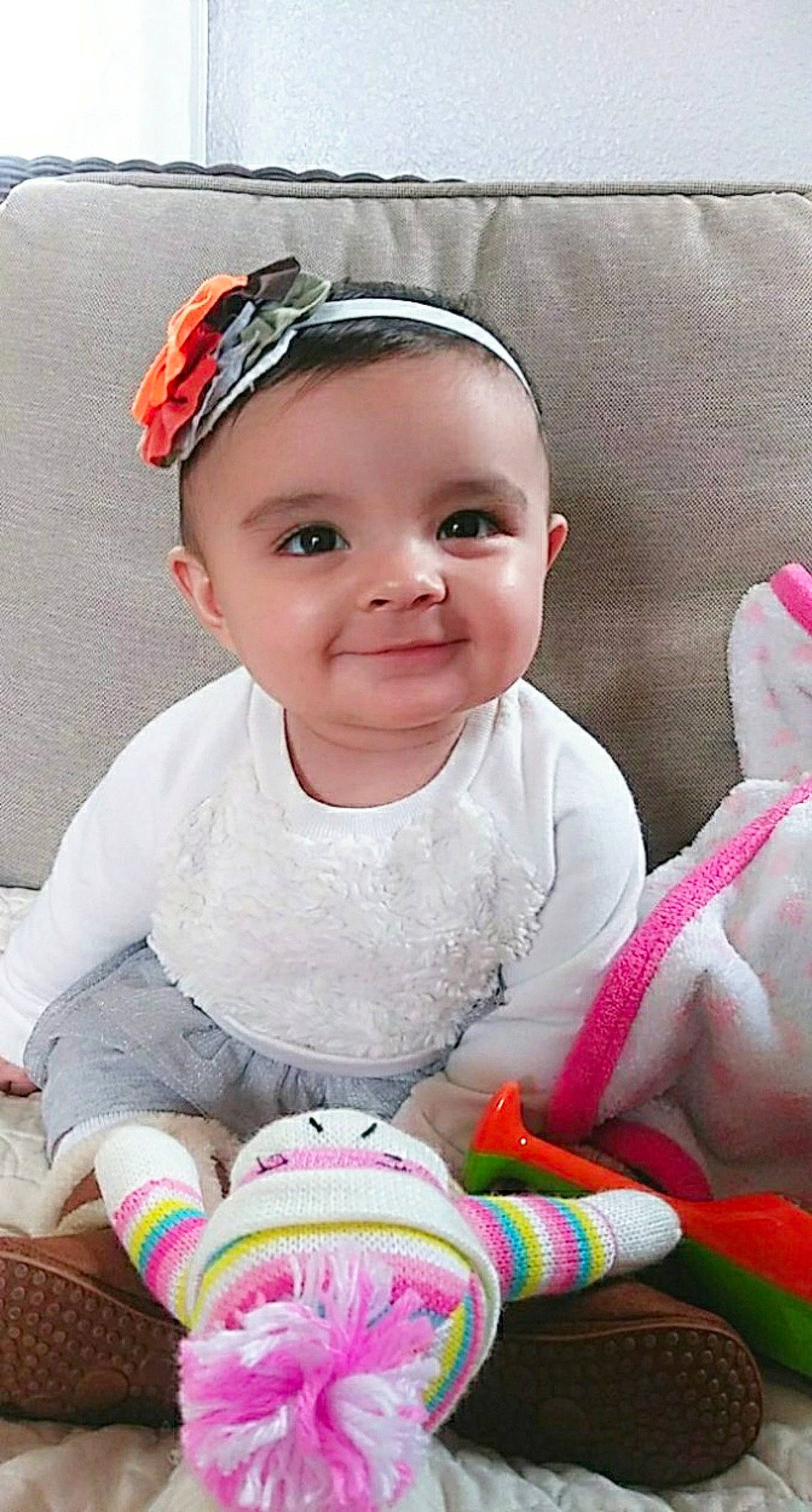 Lillyana is registered to the contest to win money with this photo: baby, baby_products, baby_toddler_clothing, cheek, child, ear, hair_accessory, happy, joy, person, pink, play, skin, smile, toddler