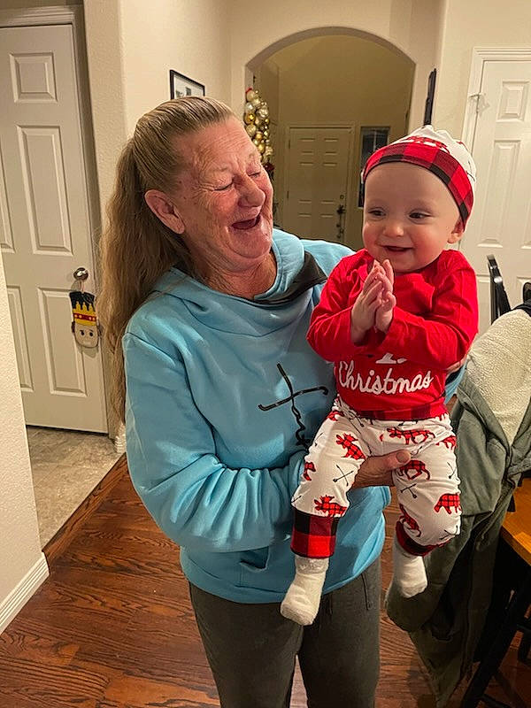 Mckenzie joined the competition — help win amazing prizes! baby, baby_toddler_clothing, child, comfort, door, event, facial_expression, fictional_character, flooring, fun, happy, hat, headwear, holiday, joy, lap, mammal, person, sitting, sleeve