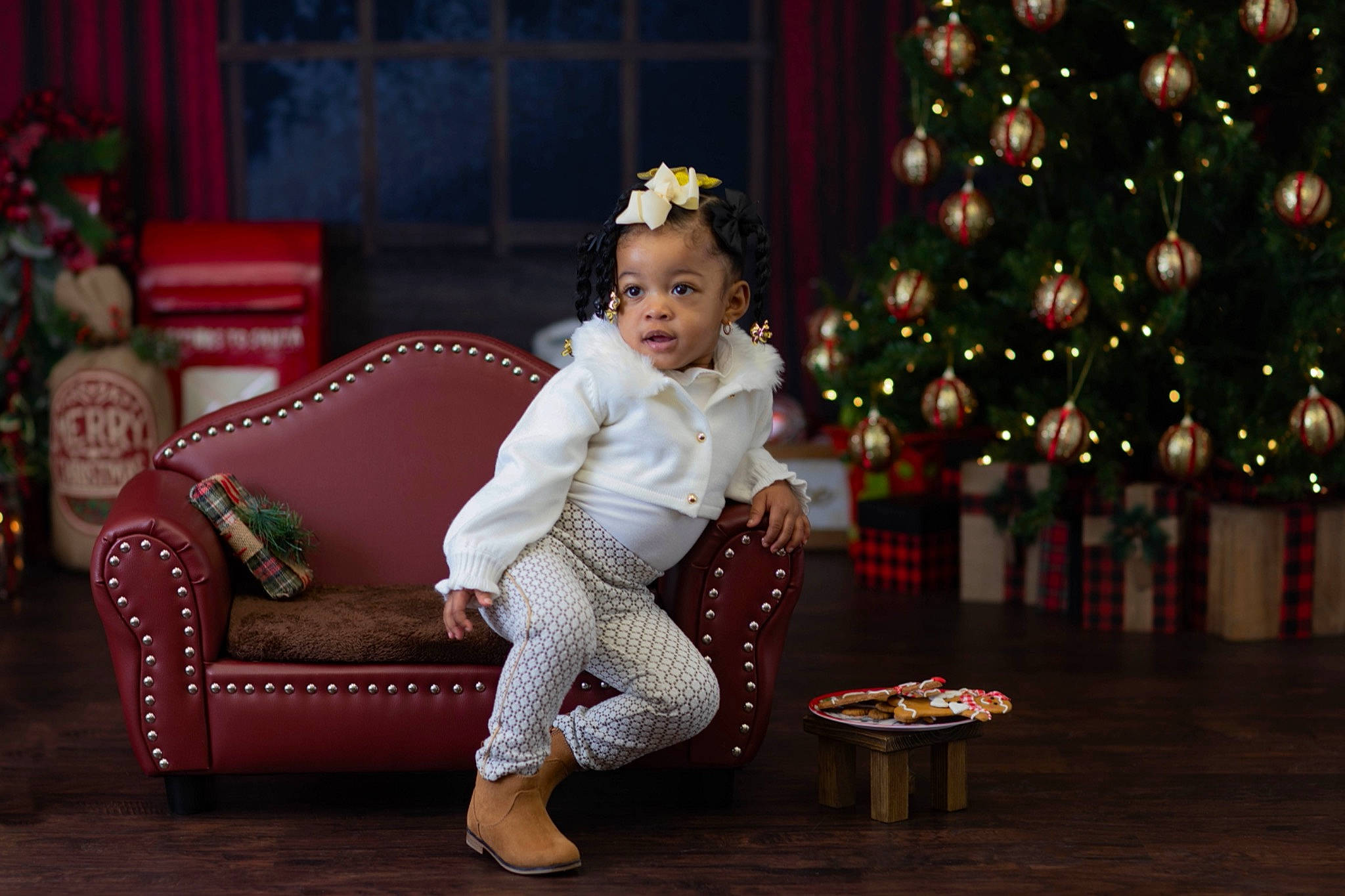 Emiliana joined the competition — help win amazing prizes! christmas_decoration, christmas_eve, christmas_tree, couch, darkness, entertainment, event, fashion_design, flash_photography, formal_wear, fun, happy, holiday, ornament, performance_art, performing_arts, person, room, sitting, toddler