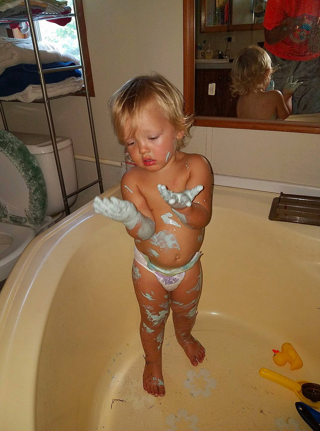 Keaton joined the competition — help win amazing prizes! arm, bathing, bathroom, child, finger, floor, flooring, foot, fun, hair, hairstyle, human_leg, joint, mouth, person, picture_frame, plumbing, plumbing_fixture, thigh, thumb