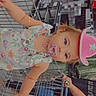 baby, child, shopping_cart, supermarket, pink_hat, star_hat, pacifier, sleeveless_outfit, portrait, indoors, grocery_store, shopping, sitting, wide_eyes, blonde_hair, infant, cart, store_shelves, adult_hand, safe