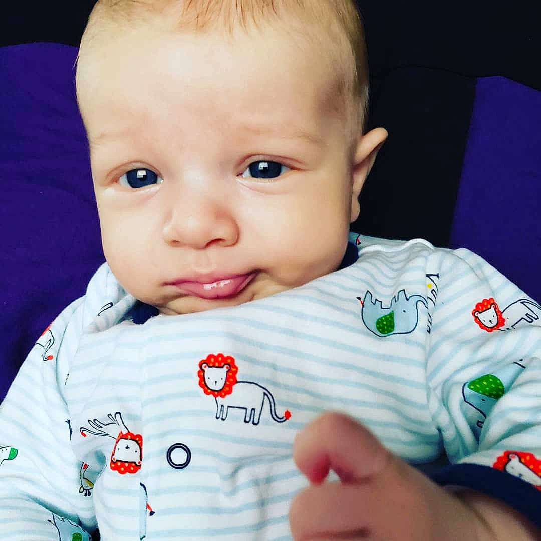 Ernest is registered to the contest to win money with this photo: baby, cheek, child, chin, cool, ear, eye, eyebrow, face, facial_expression, forehead, head, human, joy, lip, nose, organ, person, product, skin