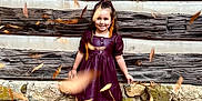 Rosemary joined the competition — help win amazing prizes! child, girl, smiling, dress, boots, leaves, fall, autumn, wooden_wall, stone_wall, outdoor, nature, playful, happy, seasonal, portrait, young, fashion, ground, casual