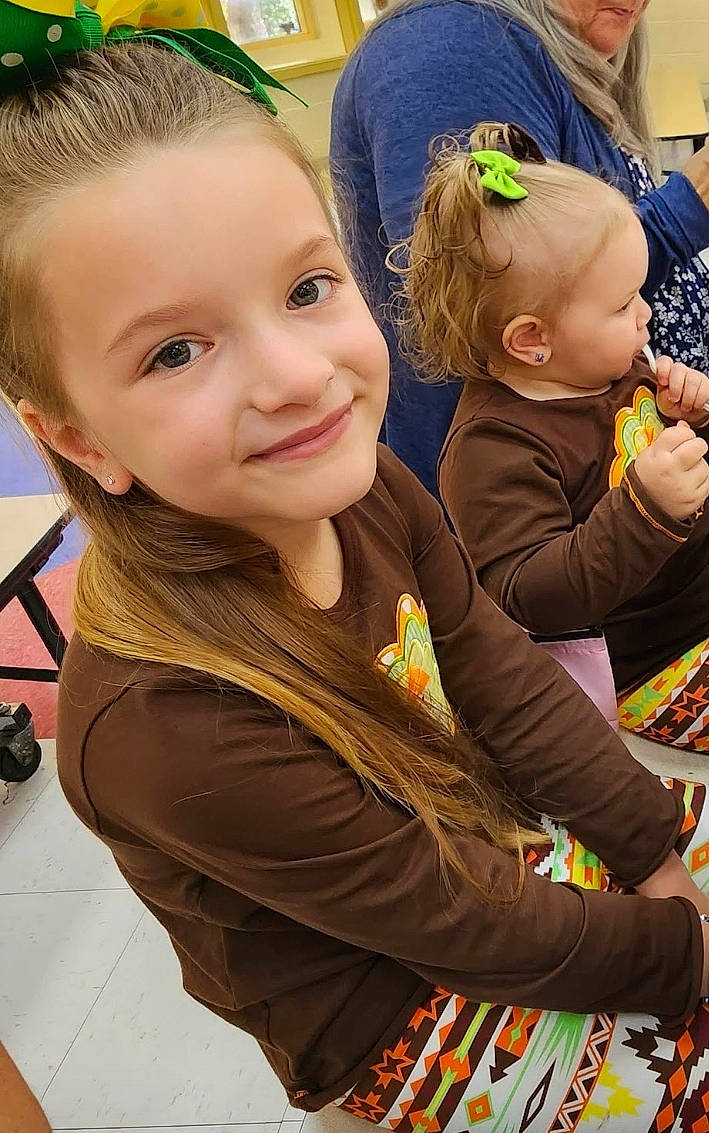 Isabella joined the competition — help win amazing prizes! baby, blond, child, flooring, fun, grass, green, happy, head, iris, joy, leisure, person, play, recreation, selfie, sitting, skin, smile, t_shirt